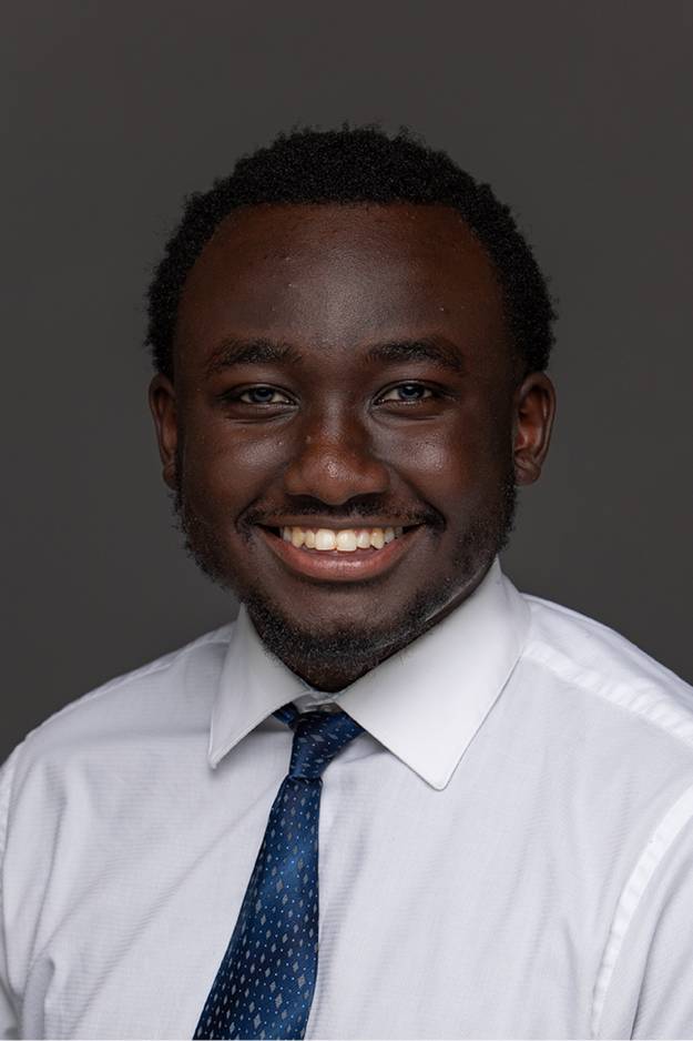 Keith Chemjor smiling for his GVSU headshot